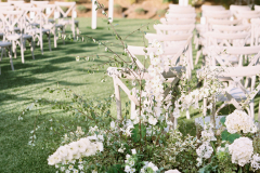 11-ceremony-garden-wedding-lining-aisle